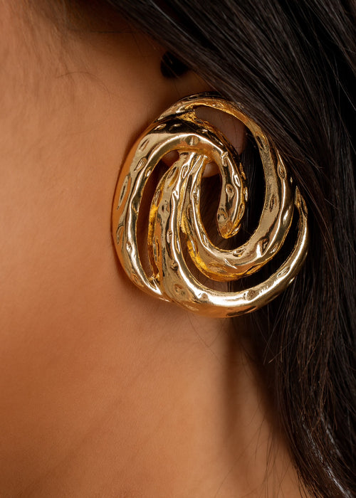 Shiny gold drop earrings with elegant design, perfect for a night out