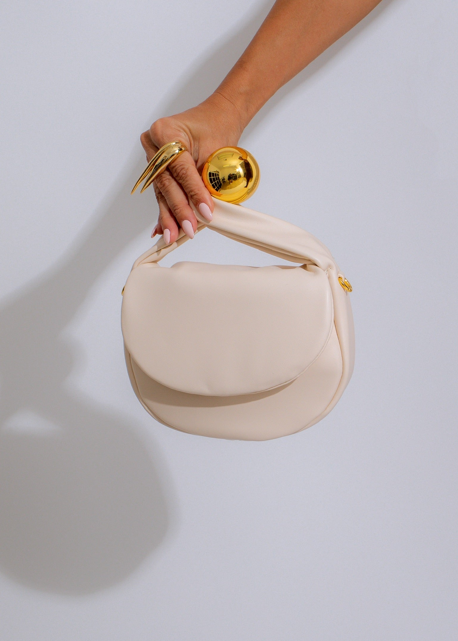 Orbit Faux Leather Handbag White, a stylish and spacious accessory for everyday use