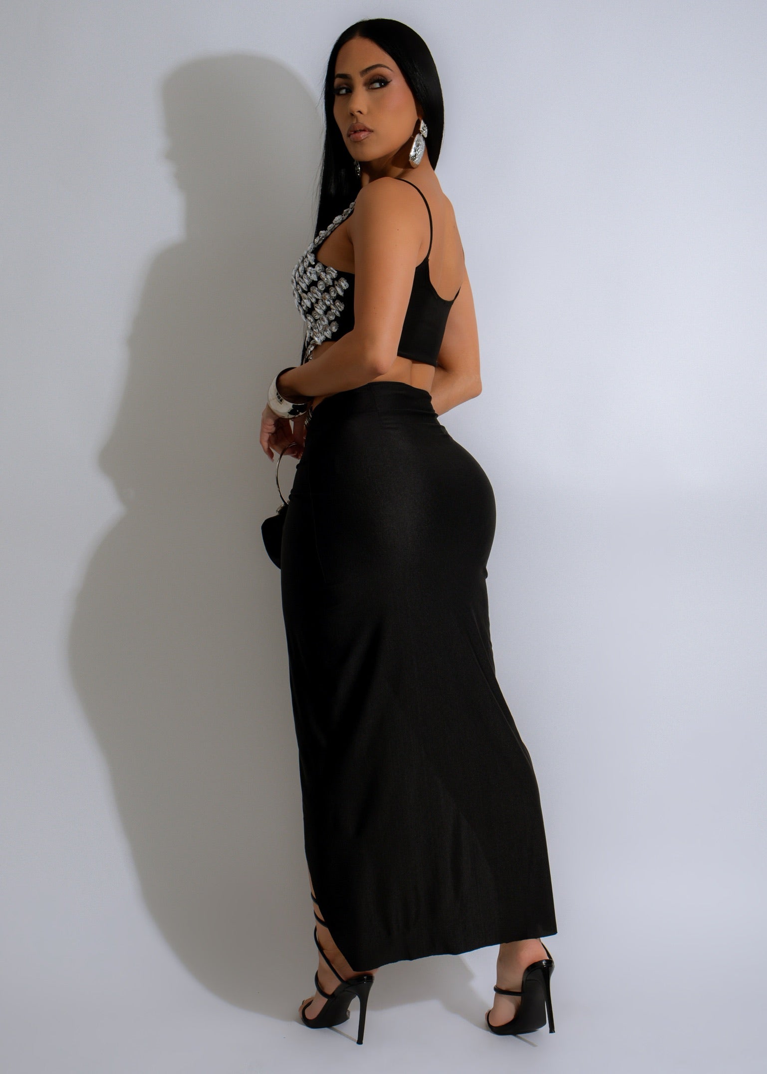 She's Shining Rhinestone Skirt Set Black: A stylish and elegant black skirt set with eye-catching rhinestone embellishments