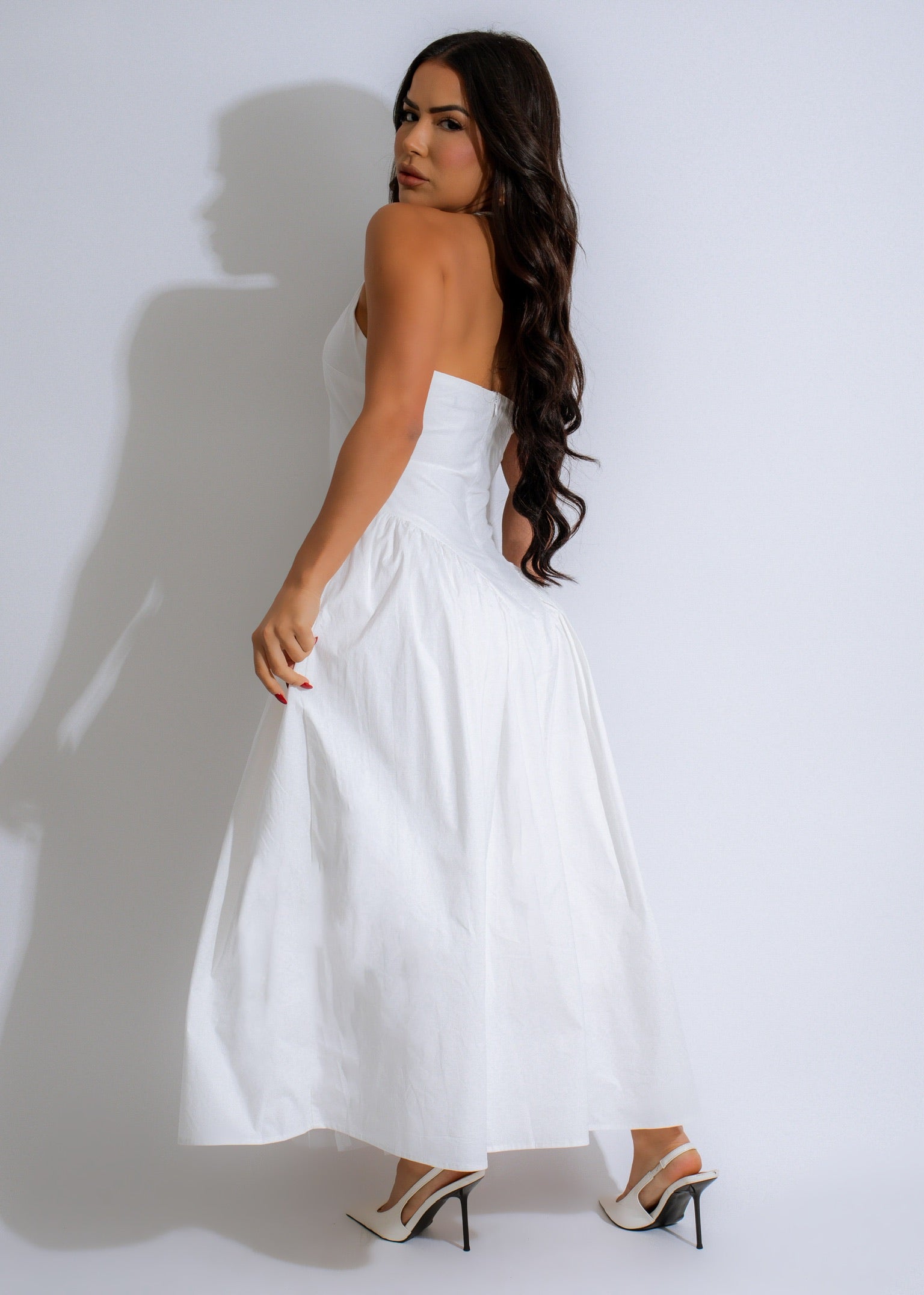 Elegant and breezy white dress with intricate bohemian-inspired details