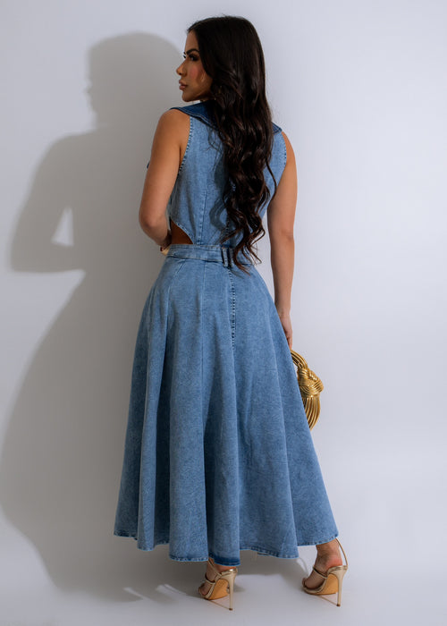  Be Free Midi Dress Light Denim shown on a model, highlighting the dress's soft denim fabric, square neckline, and versatile midi length that can be styled for various occasions
