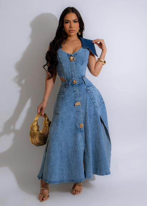 Be Free Midi Dress Light Denim in a light denim color, featuring a flattering A-line silhouette, adjustable spaghetti straps, and a flowy midi length perfect for casual summer days or dressed up evenings 