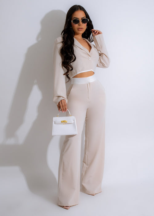 Two-piece nude pant set with a flowy top and high-waisted pants
