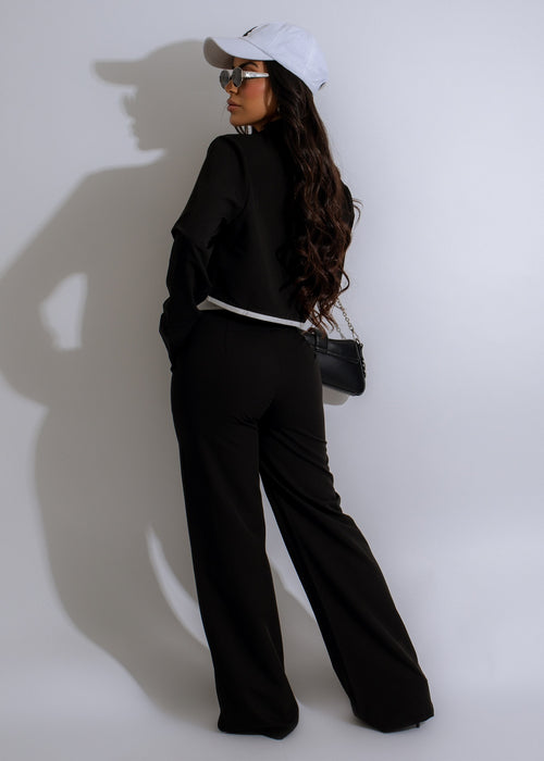  Elegant black pant set with matching top, perfect for a fashionable look