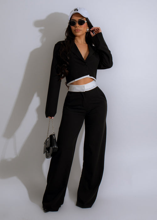 Black two-piece pant set with stylish design and comfortable fit for women 