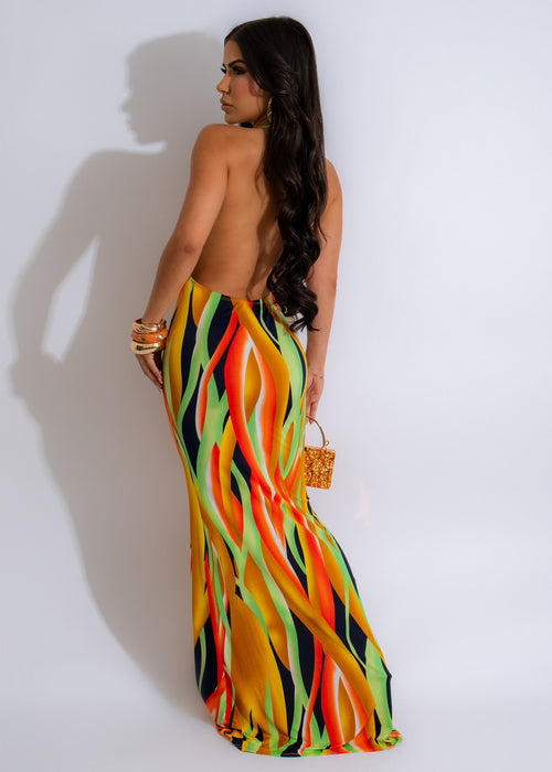 In Your Dreams Maxi Dress Green - This stunning maxi dress features a flattering empire waist, flutter sleeves, and a vibrant green color, ideal for elegant events and formal gatherings