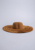 Fashionable and luxurious brown hat perfect for stylish vacation looks
