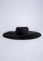Black wide-brimmed sun hat with a luxurious look, perfect for a vacation