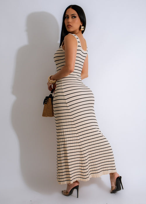 This Classic Style Ribbed Midi Dress Nude is a must-have piece, with its soft, nude color and stylish ribbed design, perfect for dressing up or down