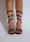 Black rhinestone studded heels with butterfly design, elegant and stylish