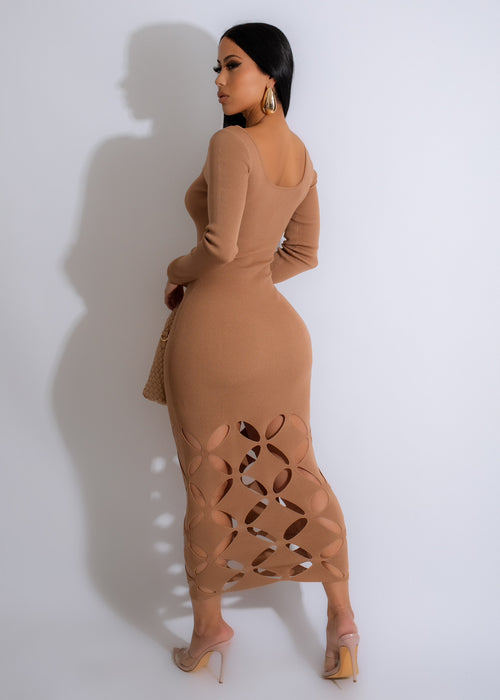  Full-body shot of a woman wearing a Slender Body Sweater Midi Dress in Nude, demonstrating its sleek and elegant design for any occasion