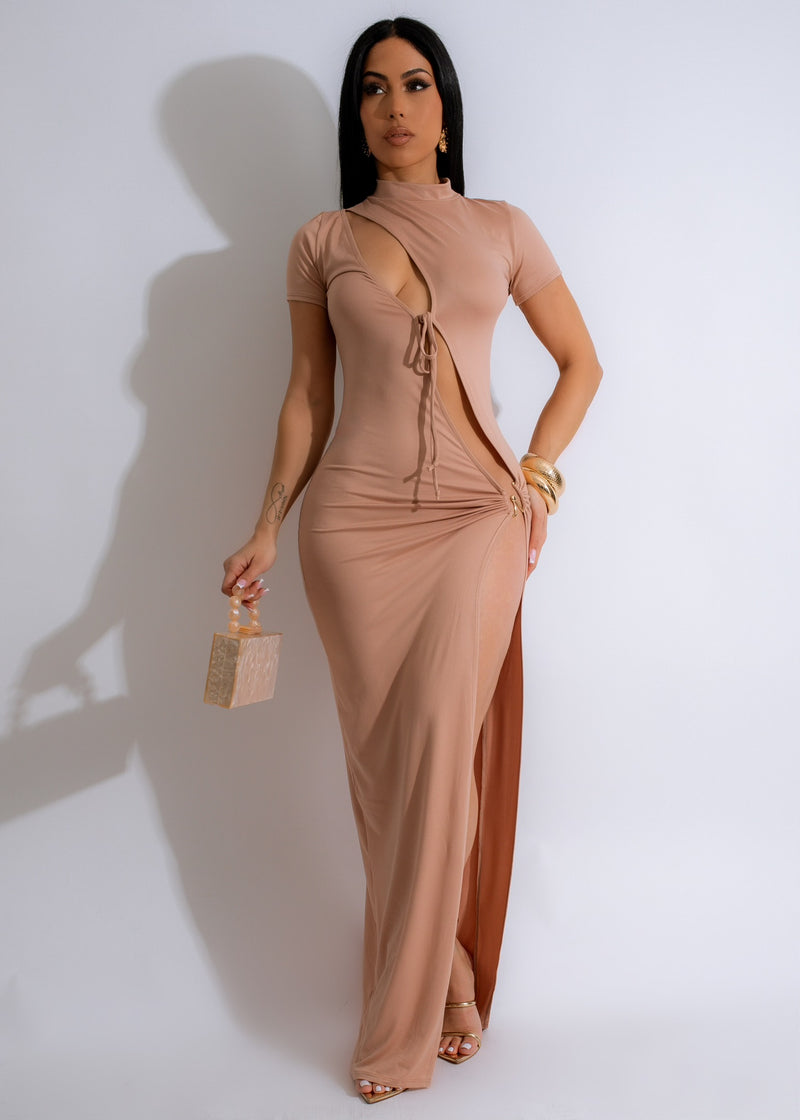###
Full-length nude maxi dress with side slit and adjustable spaghetti straps