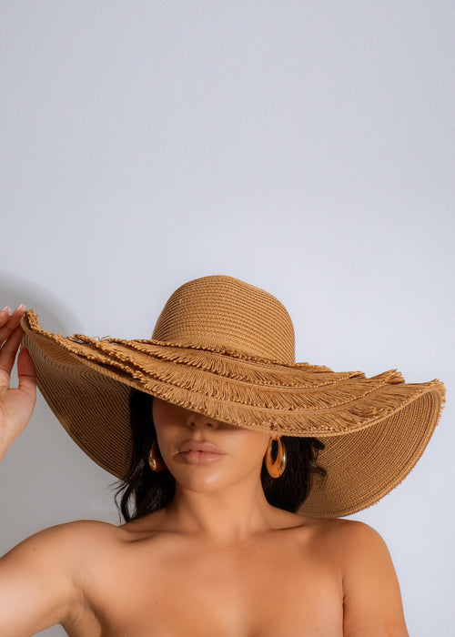 Luxury brown wide-brimmed sun hat perfect for beach vacations