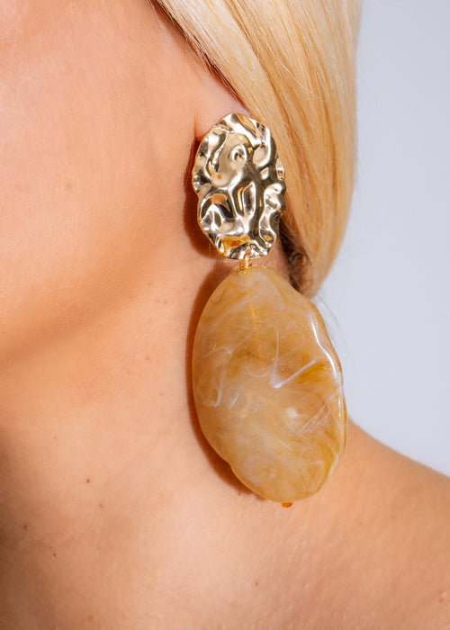 Handcrafted brown earrings with warm summer vibes and intricate details