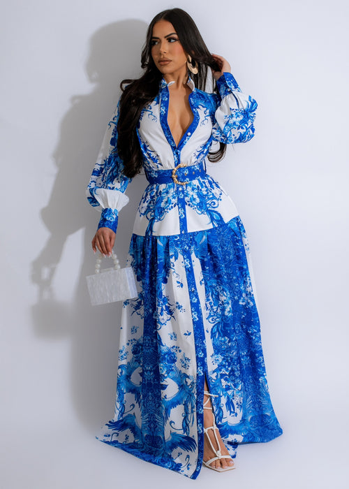 Beautiful spring ready maxi dress in stunning shade of blue with floral pattern and flowing design, perfect for any occasion