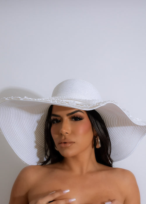Stylish and fashionable luxury white vacation hat with wide brim