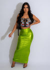 Affirmative Action Metallic Skirt Green shimmering in the sunlight on a model