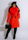 Stylish and luxurious orange fur coat for women, perfect for a bold and daring fashion statement