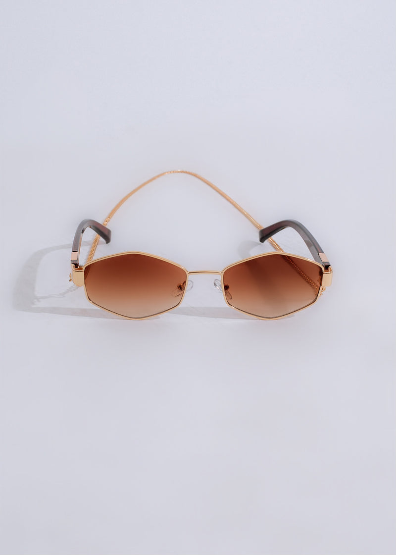 Chic and elegant brown sunglasses with oversized frames and gradient lenses