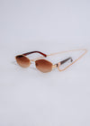 Stylish brown sunglasses with round frames and polarized lenses for women