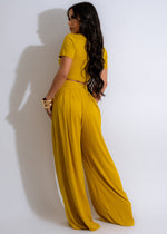 Side view of the yellow legging set showing the seamless design and stitching detail