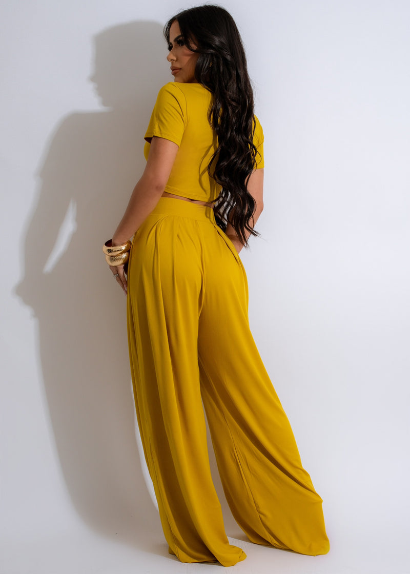 Side view of the yellow legging set showing the seamless design and stitching detail
