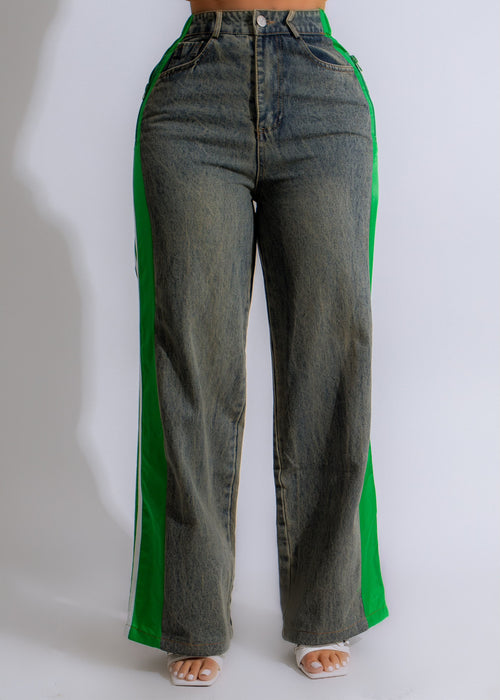Pair of vibrant green 'To Stand Out Jeans' featuring a stylish, eye-catching design