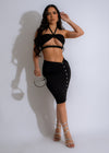 Stylish and sophisticated black skirt set featuring a flattering fit