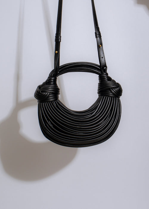  Stylish and versatile black handbag perfect for urban fashionistas