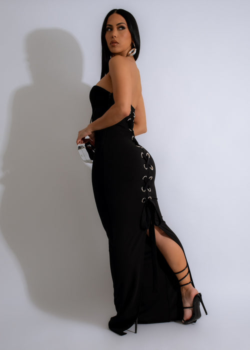 A close-up image of the Your Fantasy Maxi Dress Black, showcasing the luxurious fabric and delicate craftsmanship, ideal for creating a sophisticated and glamorous look