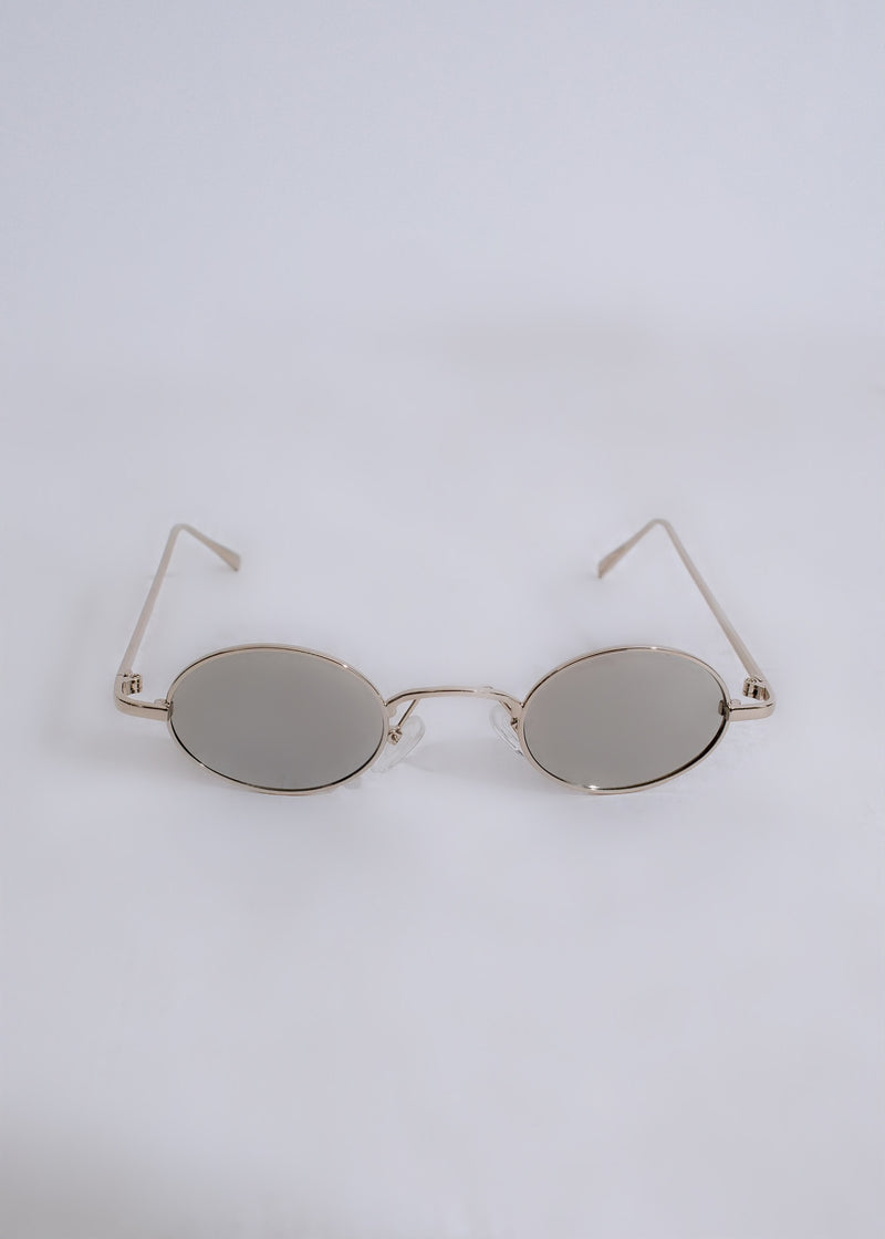 Fashionable unisex sunglasses in silver color with UV protection and modern design