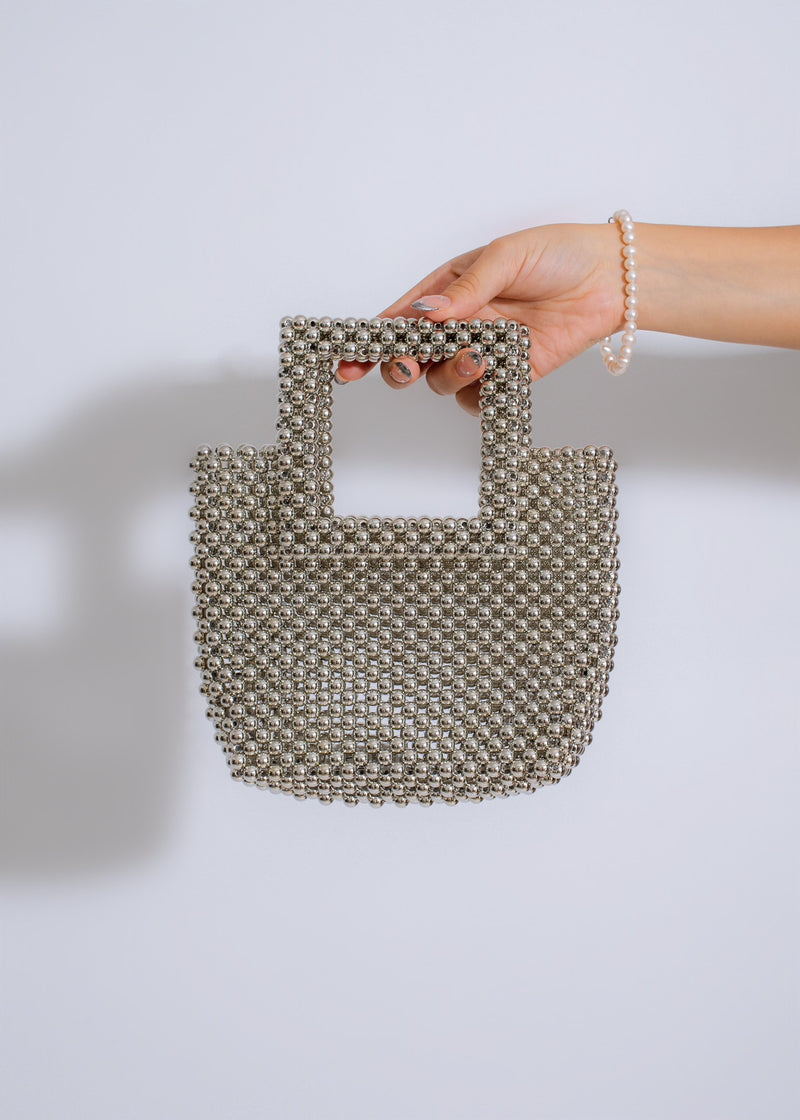 Shiny silver Simplicity Handbag with elegant and minimalist design for women