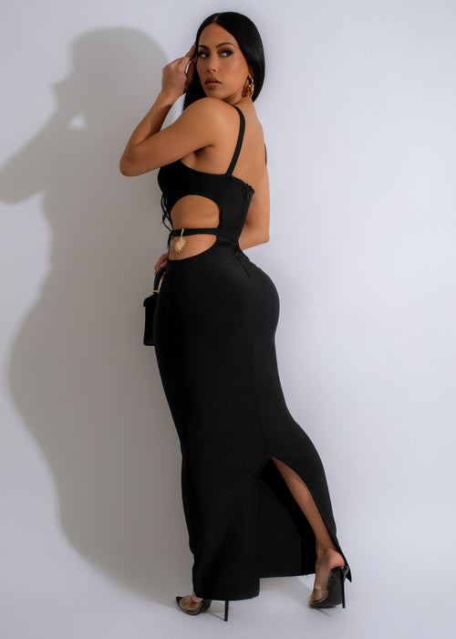 Black bandage maxi dress with a unique design to keep you entertained and stylish