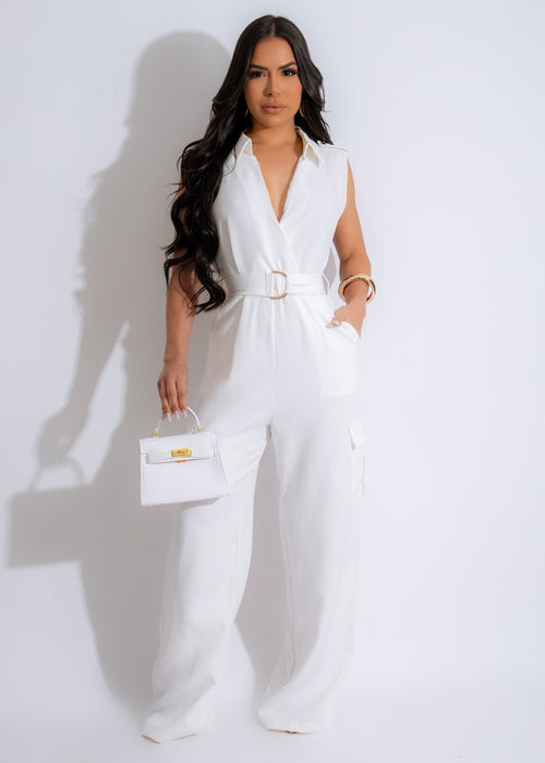 Beautiful woman wearing a stylish white cargo jumpsuit with pockets and belt 