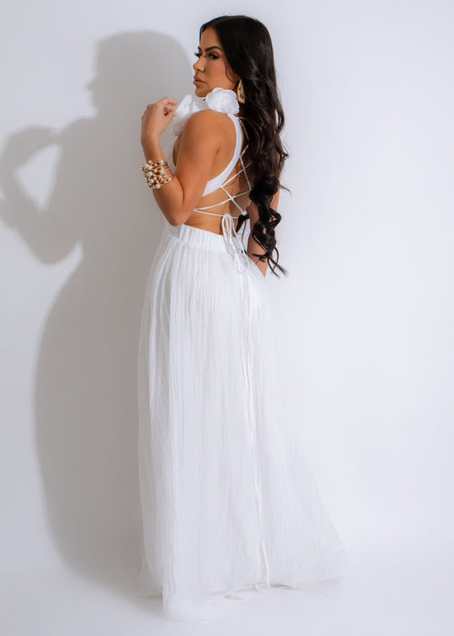 Elegant off-shoulder maxi dress in crisp white, featuring a romantic sweetheart neckline and delicate lace overlay, ideal for special occasions or formal events