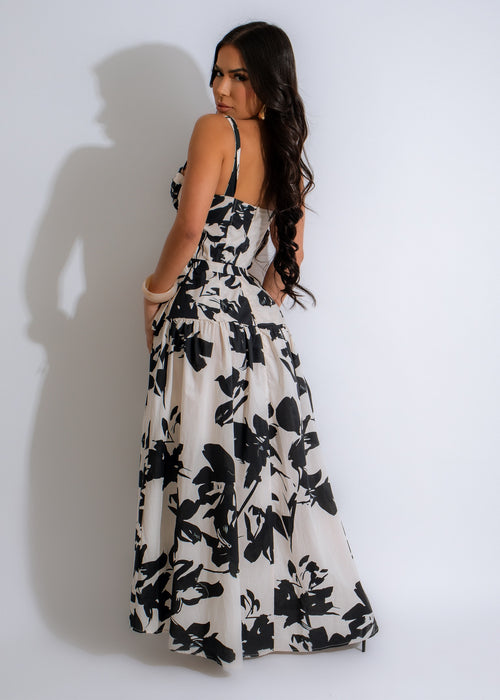  A model wearing the Cute In Leaves Maxi Dress Nude, showcasing its elegant and flattering fit, with a focus on the intricate leaf pattern and flowy design