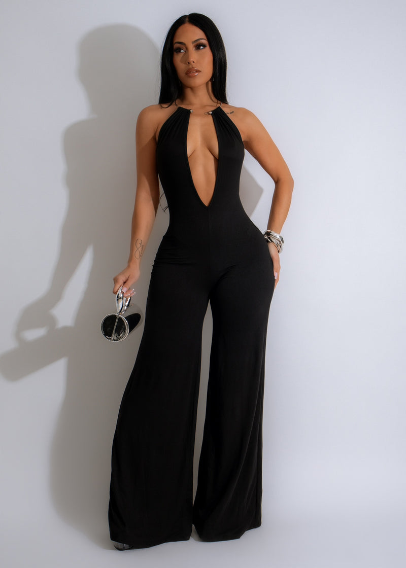 Just-Friends-Jumpsuit-Black: A stylish black jumpsuit with a flattering fit and sleek design