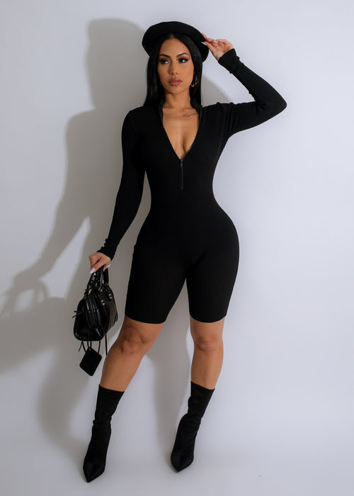 Black ribbed romper with a flattering silhouette perfect for yoga