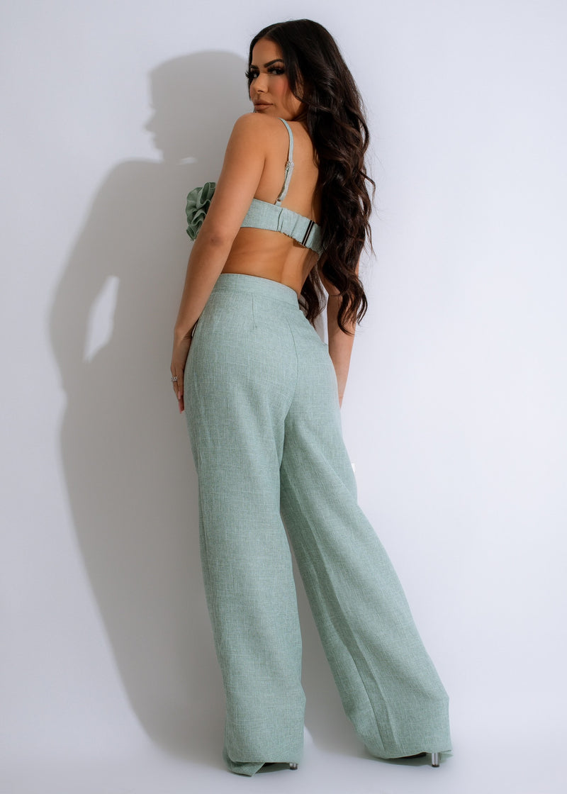 Green tweed pant set with a touch of romance, perfect for a sophisticated and stylish look