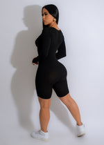 Black ribbed romper with adjustable straps and side pockets for women