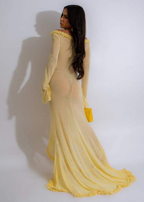  Beautiful woman wearing a bright yellow mesh maxi dress with a sexy and elegant design