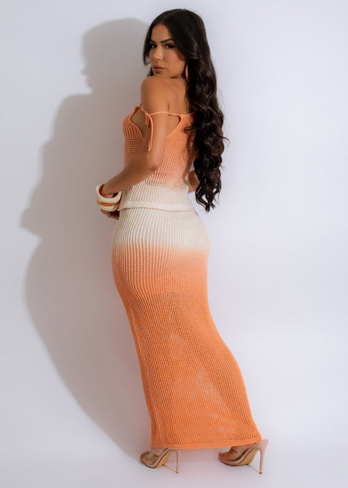 Close-up of the soft, stretchy fabric of the Simple Living Knit Skirt Set Orange, featuring a flattering midi-length skirt and a matching top with a cozy, laid-back feel