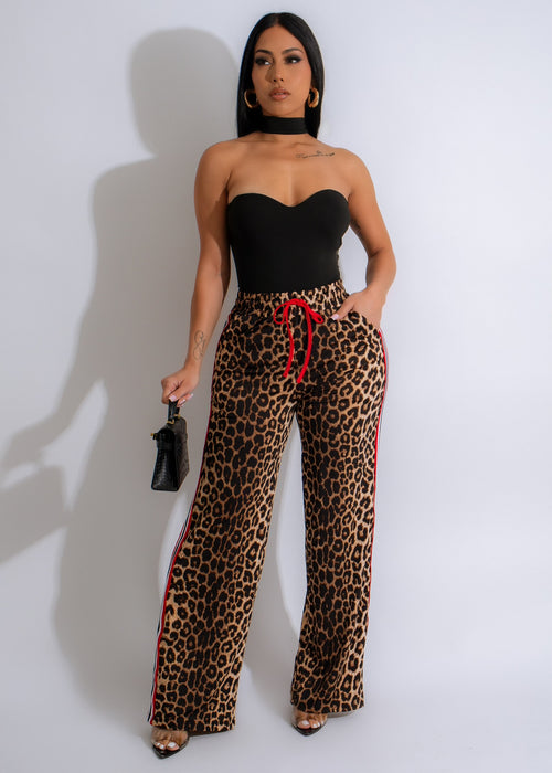 Brown, high-waisted Fierce And Fabulous pants with a slim fit design