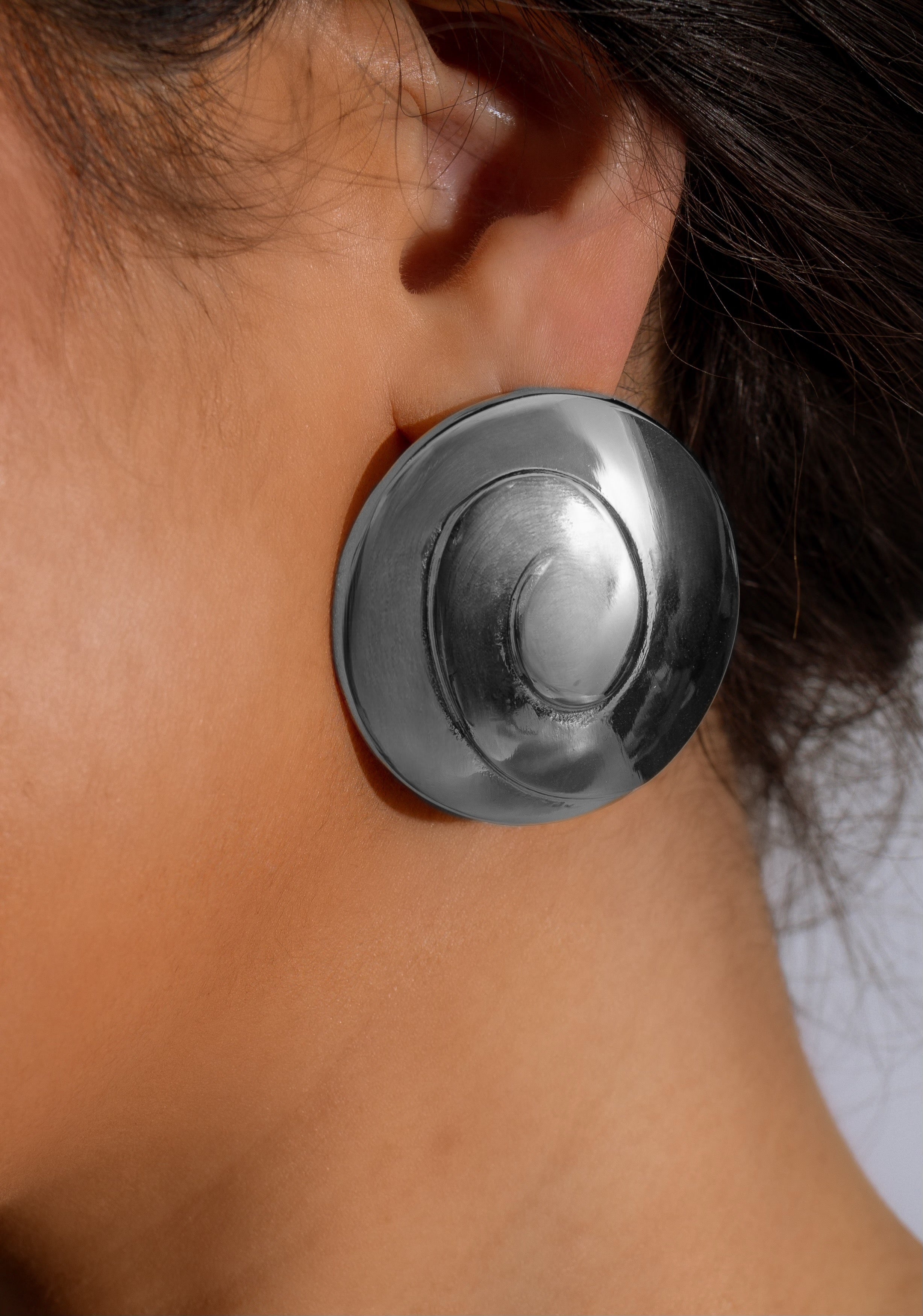 Silver dangle earrings with intricate design, perfect for adding elegance and style to any outfit, from the New Chances collection