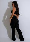 Black knitted pant set with matching top, perfect for a cozy and stylish look