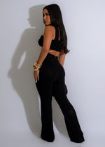 Black knitted pant set with matching top, perfect for a cozy and stylish look