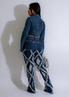  Fashionable Addicted To Us Distressed Denim Jeans in dark blue wash, styled with a rolled cuff and worn-in look
