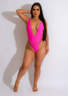 A close-up image of the Summer Moves Rhinestones Swimsuit Pink, featuring sparkling rhinestones and a flattering pink color for a stylish and glamorous beach look