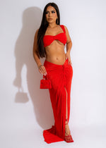 Red skirt set with matching crop top and high-waisted skirt