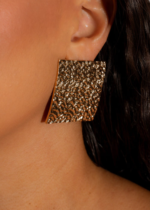 Shiny gold Exquisite Poise Earrings with intricate design and elegant detailing